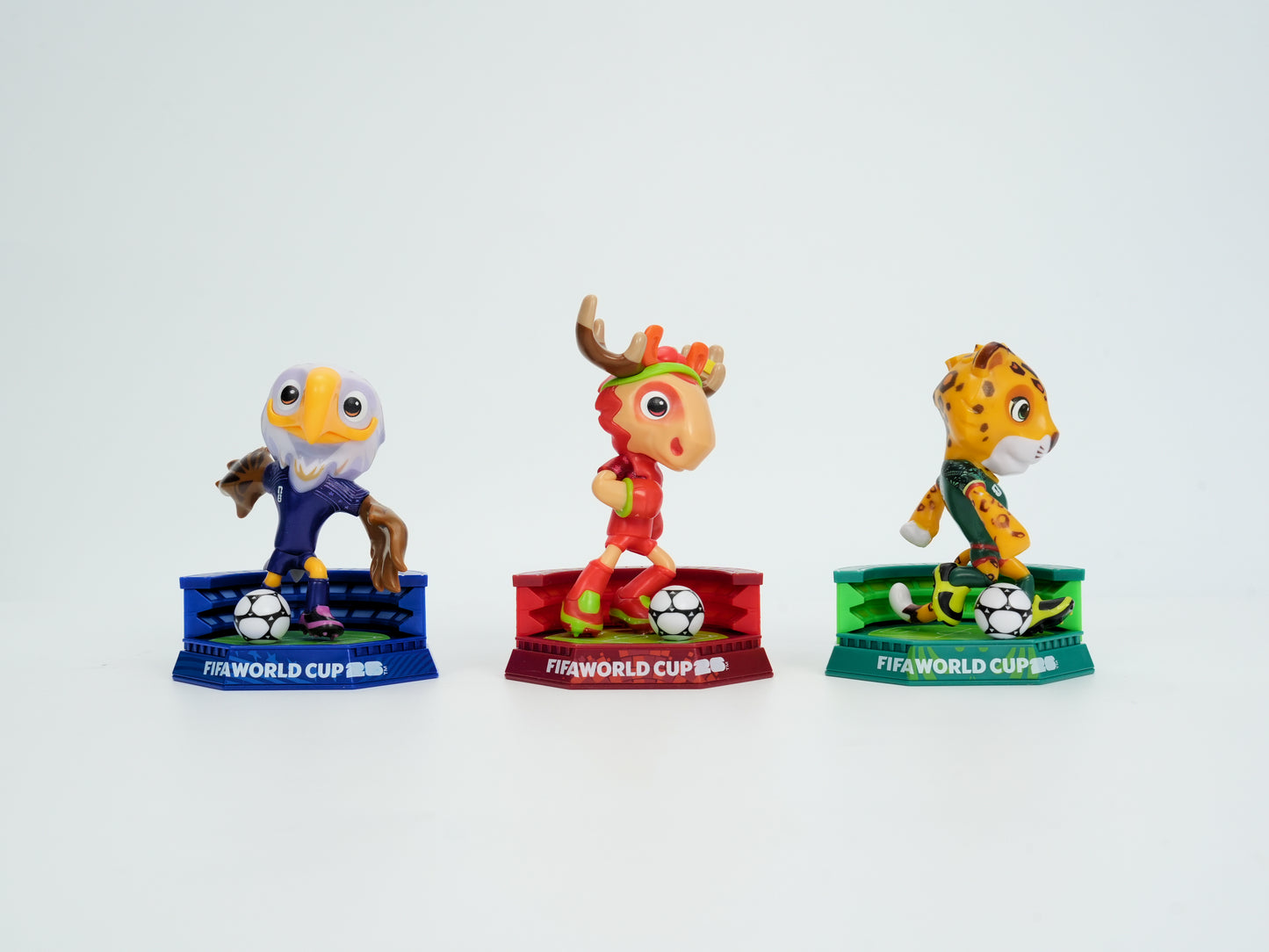 [FIFA World Cup] EXCLUSIVE OFFER with Keychain, USA-CAN-MEX Mascot Figurines Stadium Base 3Pack in Individual Acrylic Collector Box and Gift Box, Maple, Clutch and Zayu 9cm, Official Licensed Product Includes FIFA Licensed Mascot Keychain of your choice